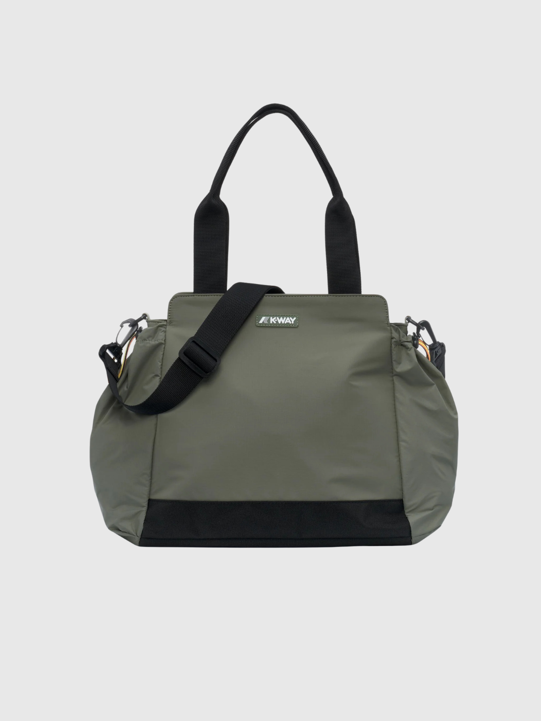 an image of a man wearing a light gray jacket with a hood