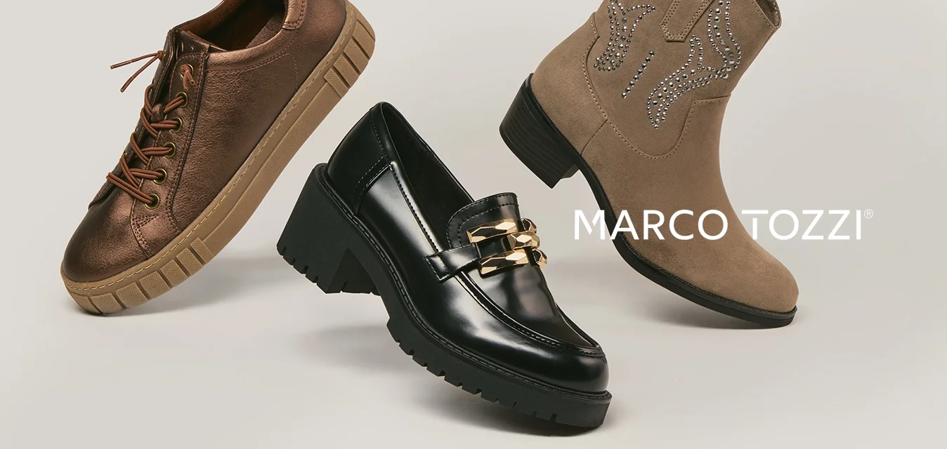 Tre paia di scarpe da donna: una sneaker bronzo con lacci, una mocassino nero con tacco grosso e catena dorata, e uno stivaletto beige in camoscio con cuciture decorative.