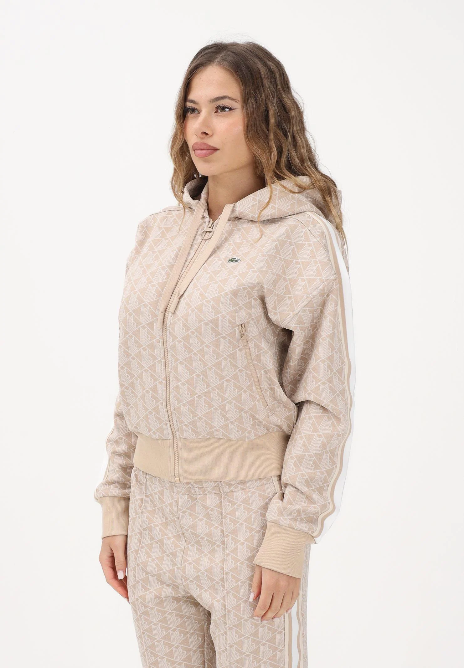 Image of LACOSTE Felpa con zip beige da donna in jacquard con monogramma