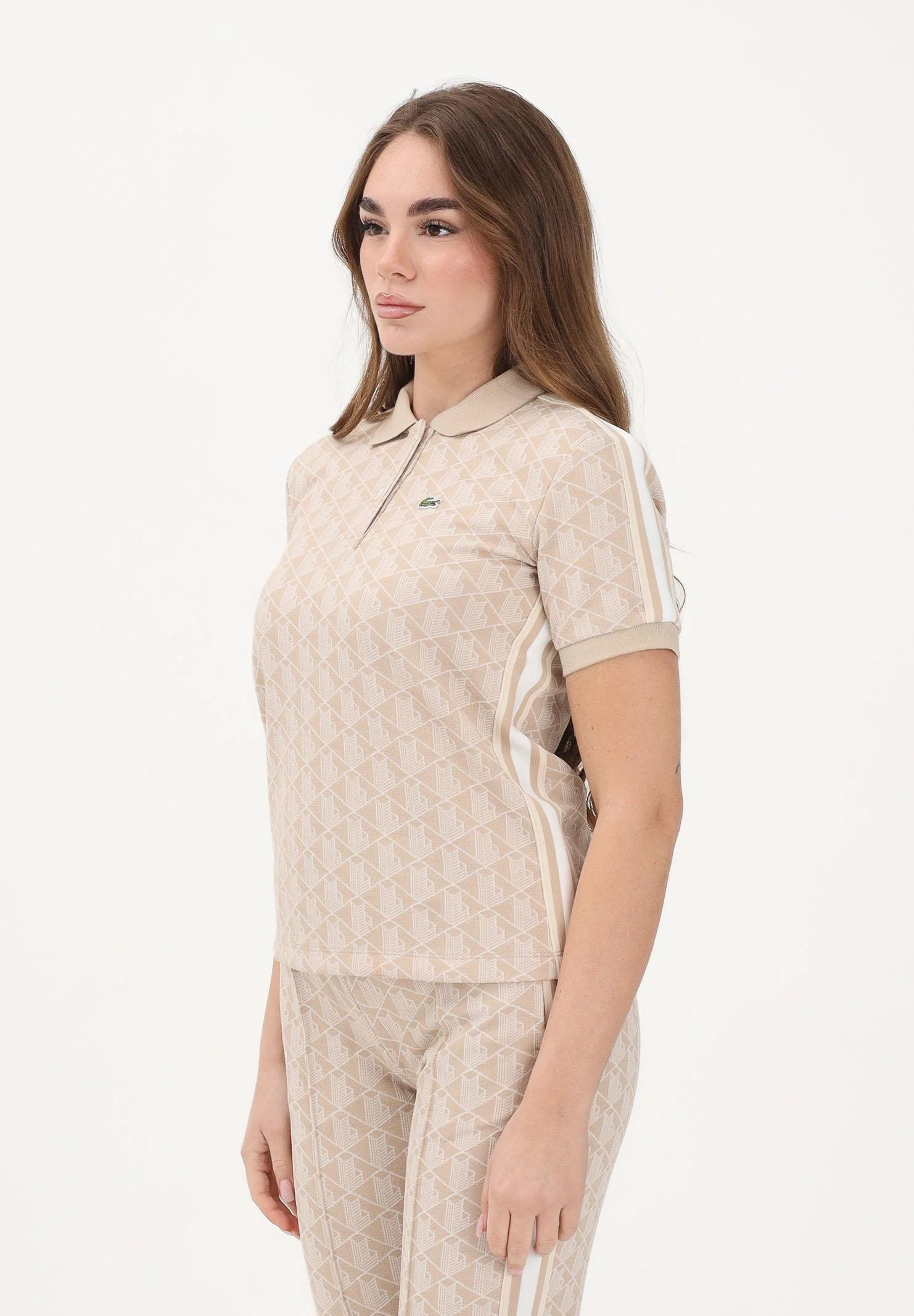 Image of LACOSTE Polo a manica corta beige da donna con fantasia monogramma