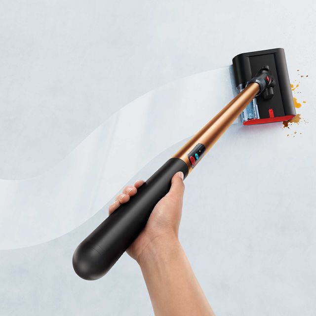 Dyson PencilWash wet floor cleaner effortlessly glides in a slalom motion.