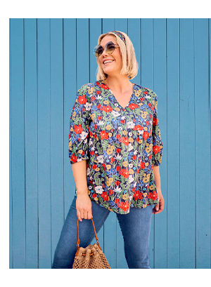 Blusa dal taglio svasato con glitter, fiori, scollo a V e maniche a 3/4