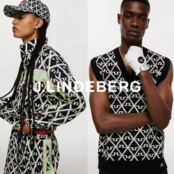 Abbigliamento sportivo con un audace motivo geometrico in nero, bianco e verde. Include una giacca con zip e un top senza maniche con dettagli.