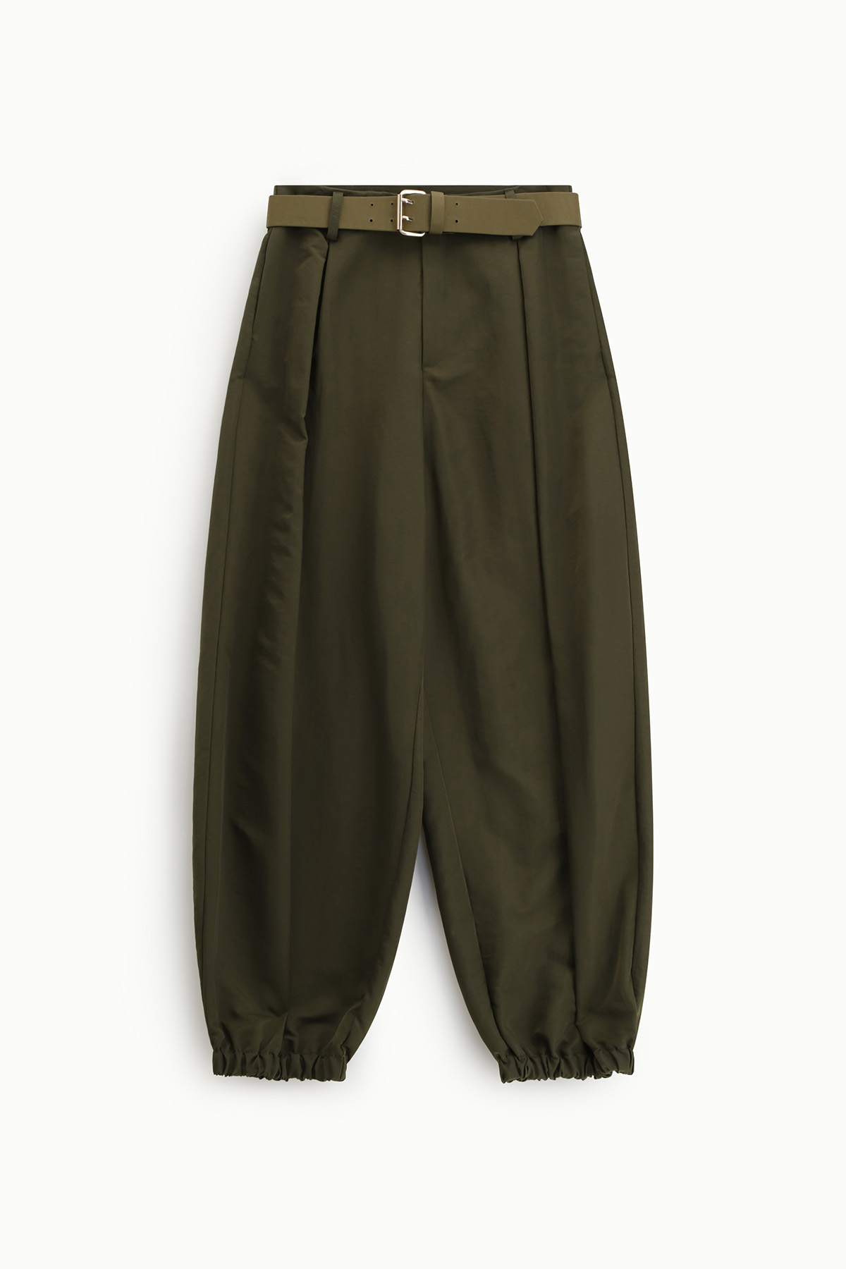 Olive green high-waisted tapered trousers with matching belt and elastic gathered cuffs, flat-lay on white background