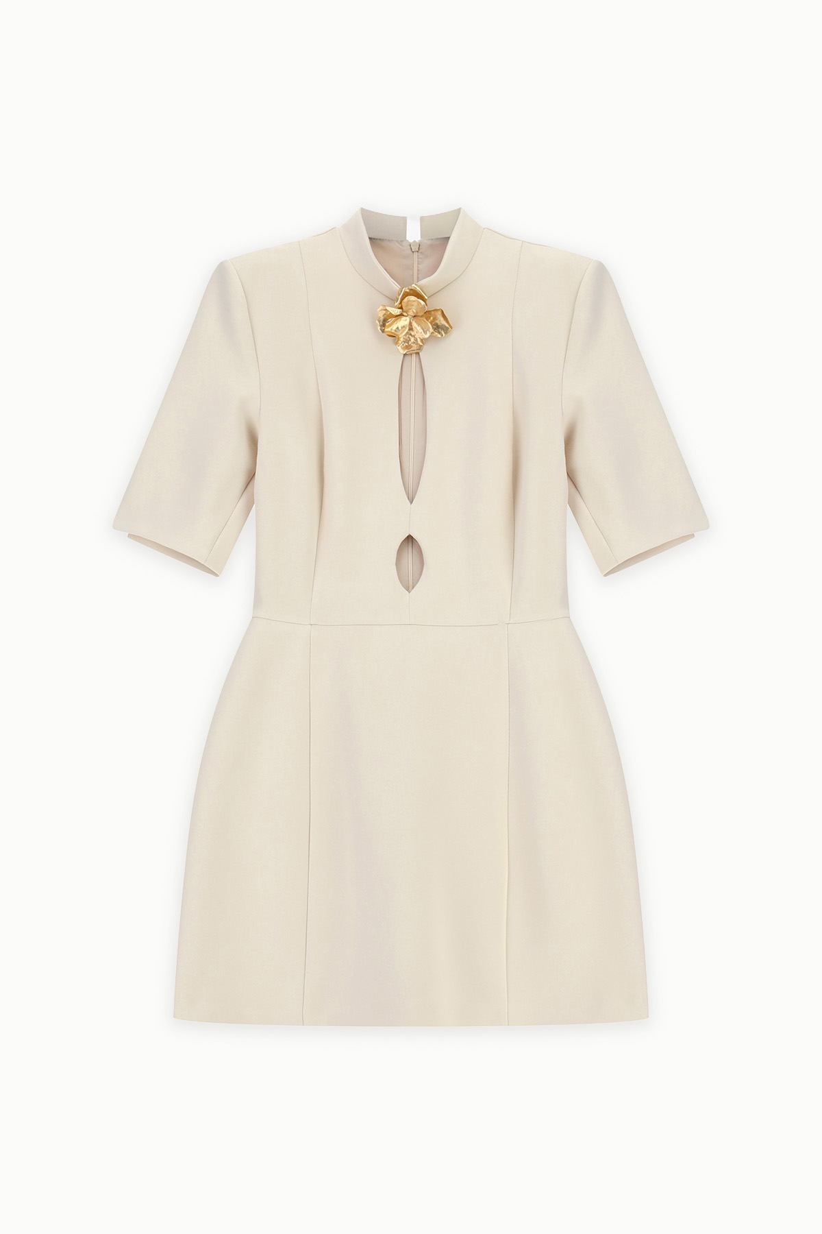 Cream short-sleeve tailored mini dress with high neckline, two front keyhole cutouts and gold floral brooch detail