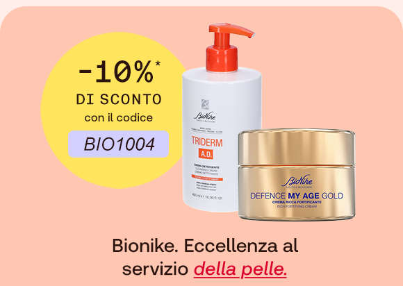 Due prodotti BioNike su sfondo pesca: detergente Triderm A.D. e crema Defence My Age Gold. A sinistra un bollino giallo indica: &ldquo;-10% di sconto con il codice BIO1004&rdquo;. In basso il testo: &ldquo;Bionike. Eccellenza al servizio della pelle&rdquo;, con &ldquo;della pelle&rdquo; evidenziato in rosso corsivo e sottolineato.