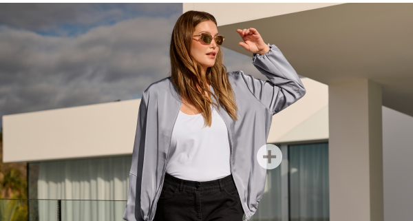 Giubbotto dal taglio svasato con colletto basso in maglia e maniche lunghe