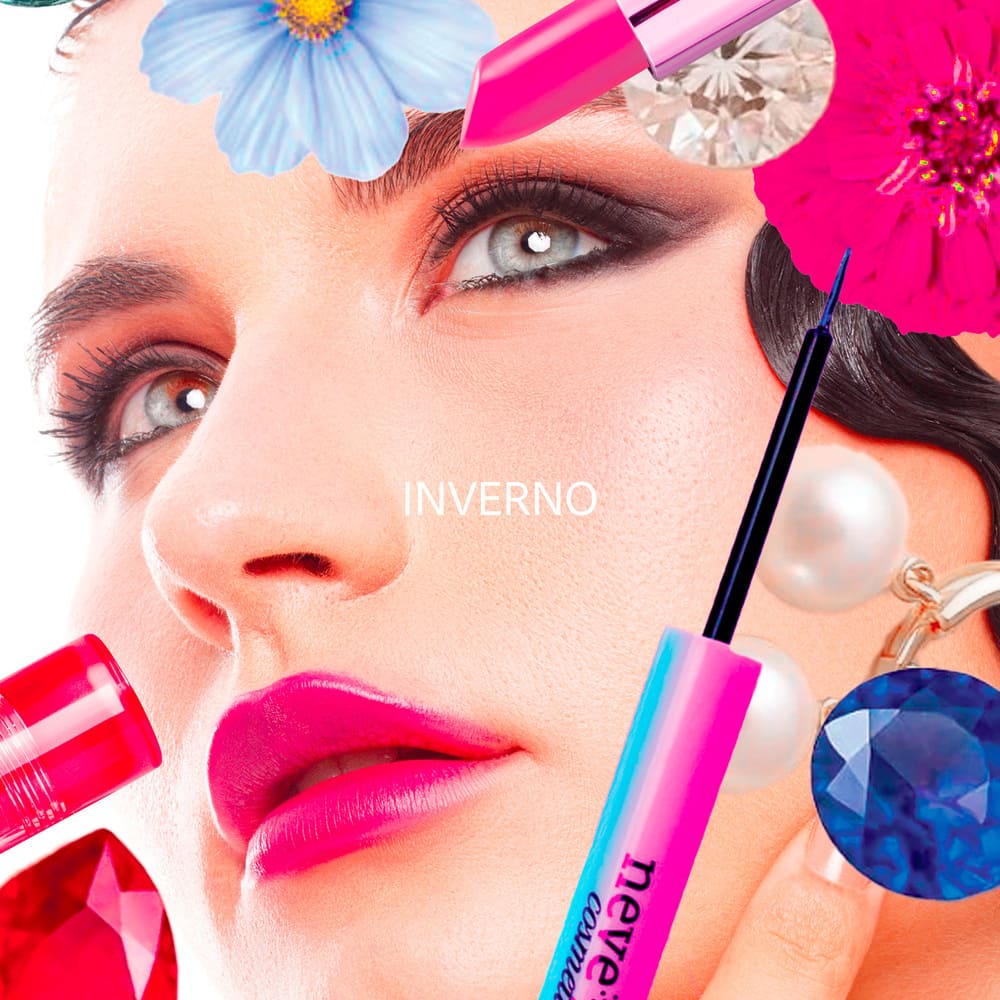 Close-up of a woman's face with bold pink lipstick and smoky eyes, surrounded by colourful cosmetics, pearls, flowers and the word 'INVERNO'