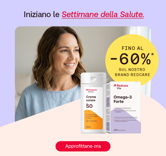Donna sorridente con maglietta azzurra guarda verso destra. In primo piano prodotti Redcare: crema solare SPF 50 e Omega-3 Forte. In alto il testo: &ldquo;Iniziano le Settimane della Salute&rdquo;, con &ldquo;Settimane della Salute&rdquo; evidenziato in rosso corsivo e sottolineato. A destra un bollino giallo indica: &ldquo;Fino al -60% sul nostro brand Redcare&rdquo;. In basso pulsante rosso: &ldquo;Approfittane ora&rdquo;.