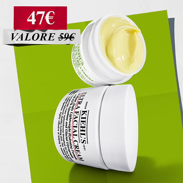 Duo Kiehl's Hydrating Hits con Ultra Facial Cream e Creamy Eye Treatment with Avocado aperti, che mostrano le texture ricche e cremose su sfondo verde acceso.