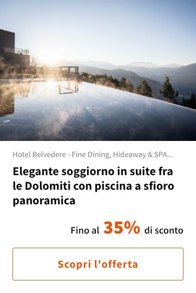 Elegante soggiorno in suite fra le Dolomiti con piscina a sfioro panoramica