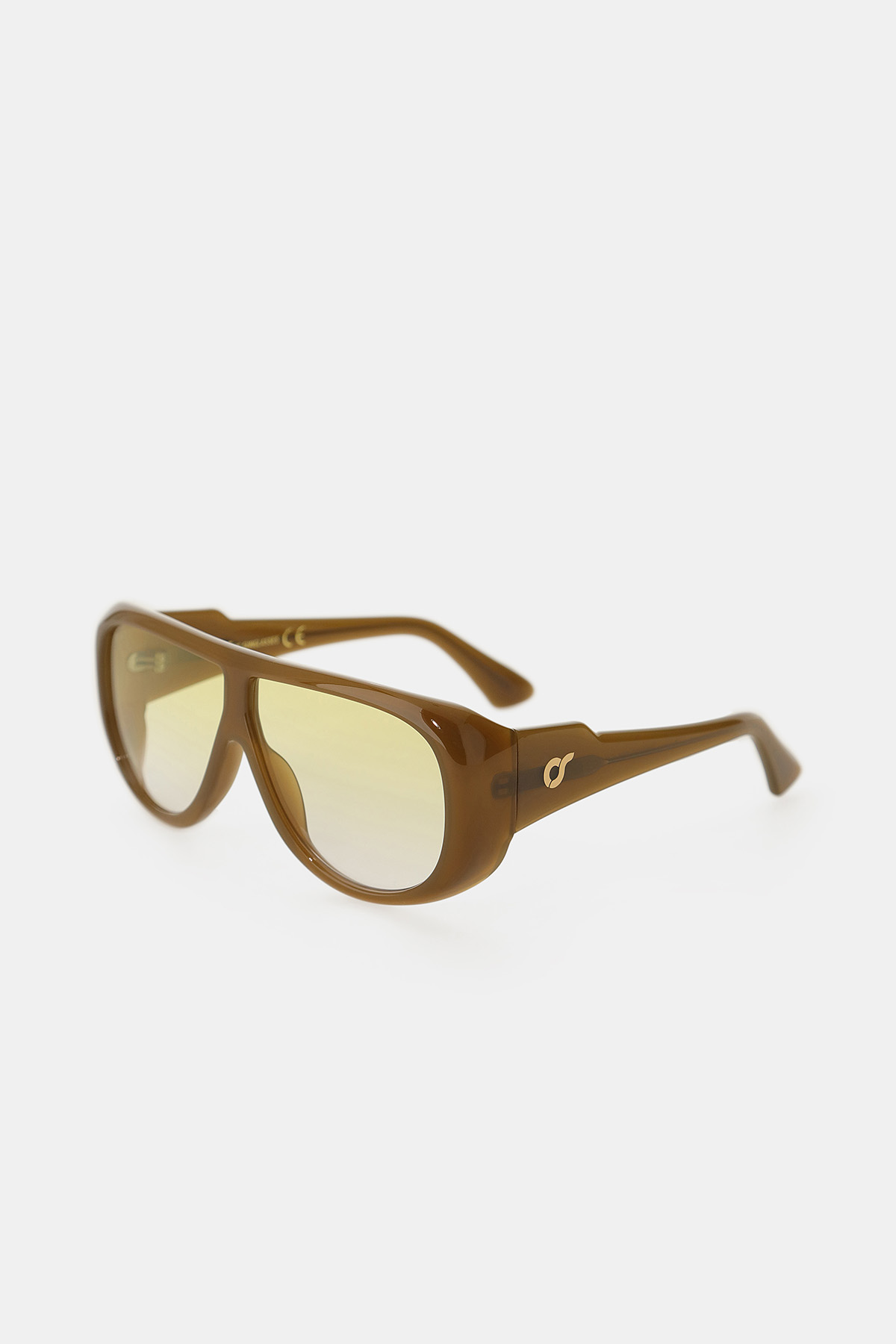 Brown acetate oversized sunglasses with yellow-tinted lenses and gold logo on temple, angled on white background
