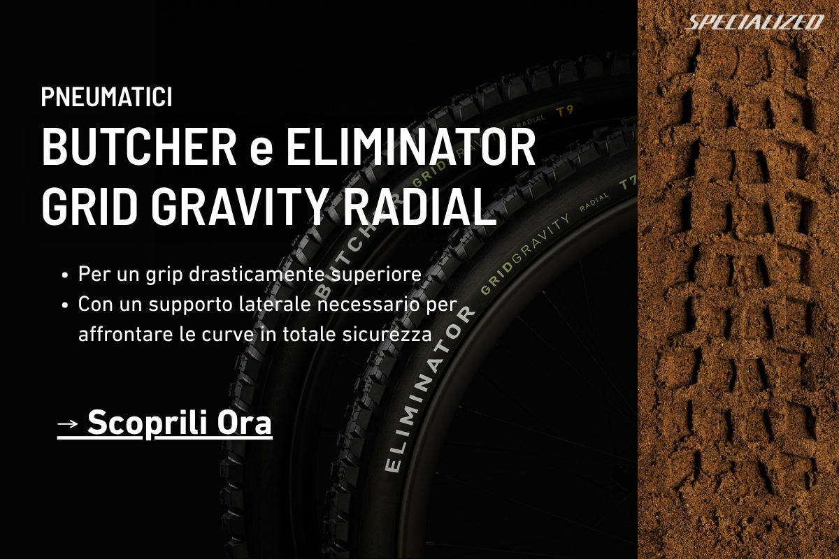 Close-up of Specialized Butcher and Eliminator Grid Gravity Radial mountain bike tyres, stacked black rims and muddy tread