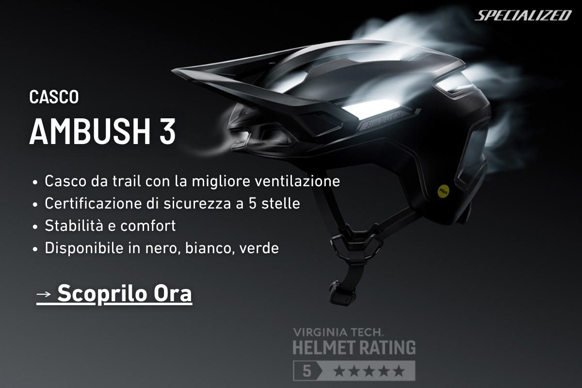 Specialized Ambush 3 trail helmet in matte black with visor, MIPS logo and ventilated aerodynamic design on dark background