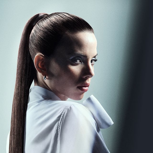 Model with a sharp Haute ponytail style, achieved using Dyson Beauty devices.