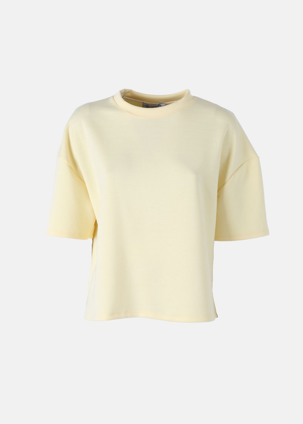 Women's pale yellow boxy cropped T‑shirt with short sleeves and crew neck on white background