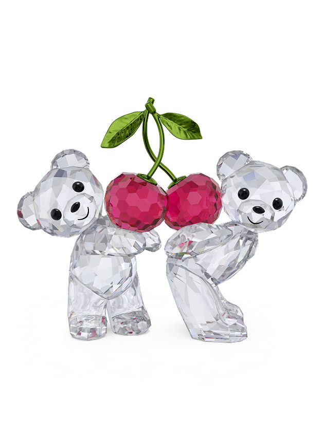 Due teneri orsetti con due ciliegie