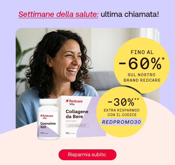 Donna sorridente con maglietta azzurra guarda verso destra. In primo piano prodotti Redcare: crema solare SPF 50 e Omega-3 Forte. In alto il testo: &ldquo;Iniziano le Settimane della Salute&rdquo;, con &ldquo;Settimane della Salute&rdquo; evidenziato in rosso corsivo e sottolineato. A destra un bollino giallo indica: &ldquo;Fino al -60% sul nostro brand Redcare&rdquo;. In basso pulsante rosso: &ldquo;Approfittane ora&rdquo;.