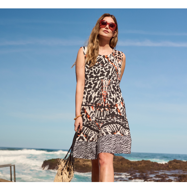 Abito dal taglio svasato e smanicato in jersey con bordure, tasche e scollo a girocollo