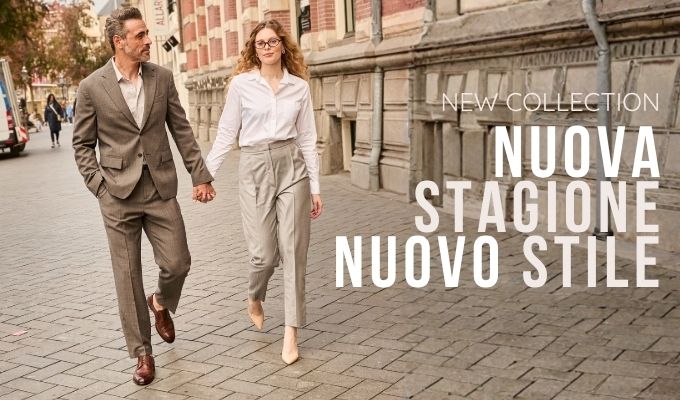 Couple holding hands on cobblestone street in neutral tailored outfits; text: 'NEW COLLECTION' and 'NUOVA STAGIONE, NUOVO STILE'
