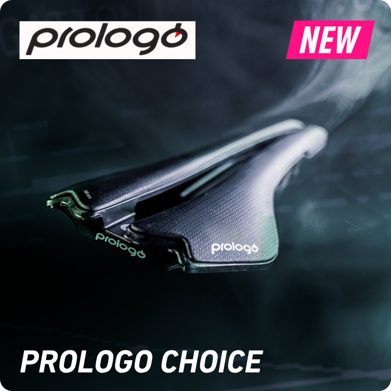 Close-up of a Prologo Choice ergonomic black bicycle saddle with Prologo logos and a pink "NEW" label