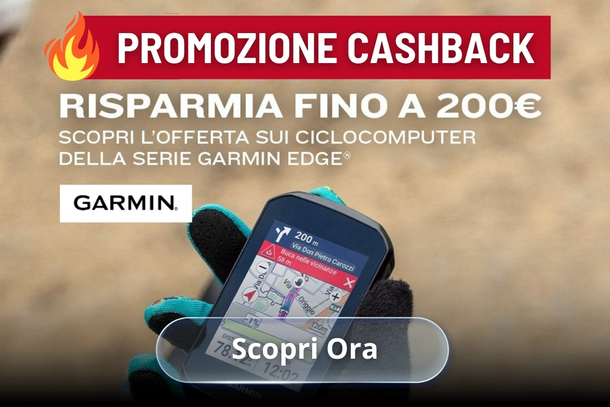 Garmin Edge cycle computer on a gloved hand showing map, promotional banner advertising cashback savings up to €200