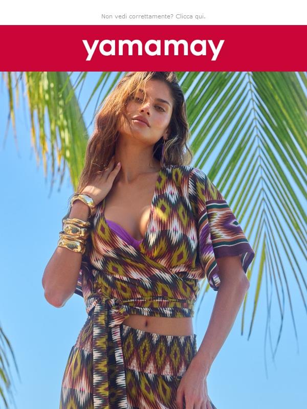 Costumi e moda mare con stampe geometriche e colori vibranti