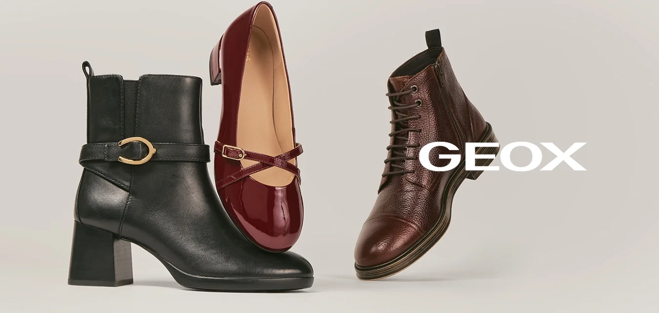 Tre paia di scarpe da donna: stivale alla caviglia nero con tacco e fibbia, ballerina lucida rossa scura Mary Jane, e stivale in pelle marrone con lacci.