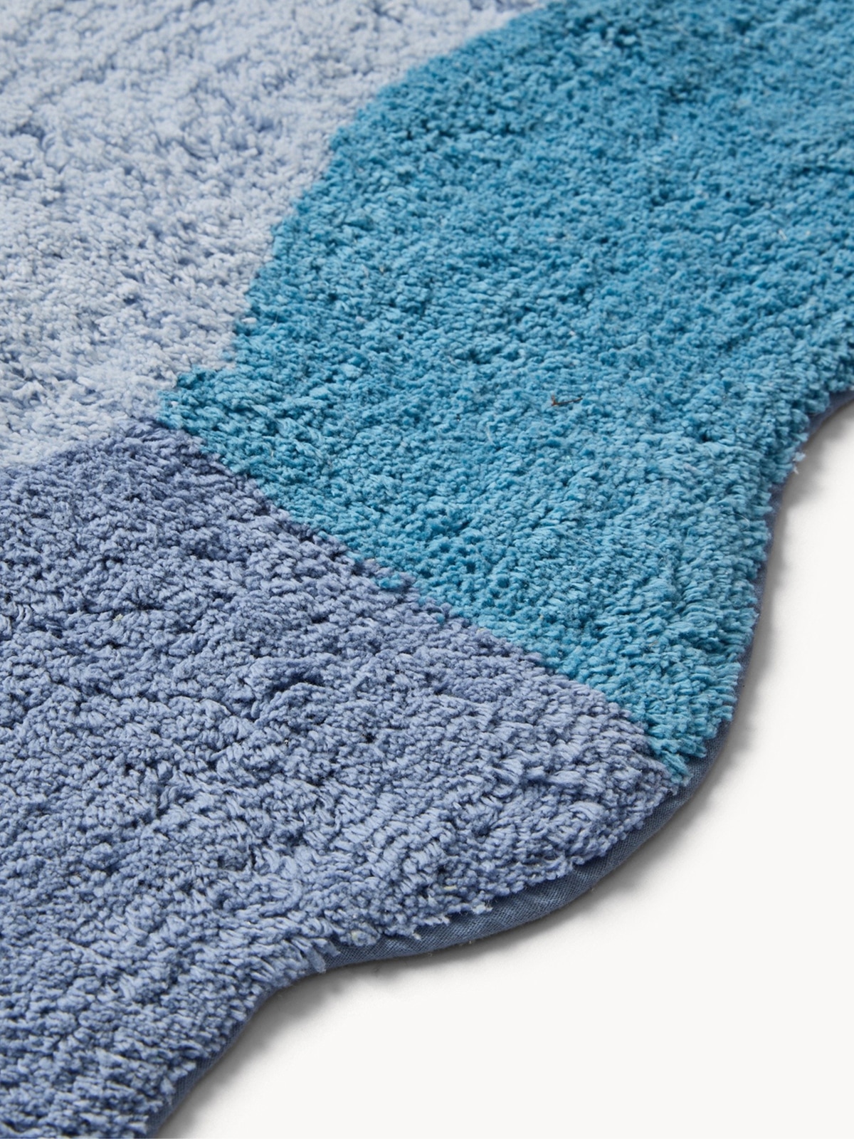 Tappeto bagno in cotone taftato bordo ondulato