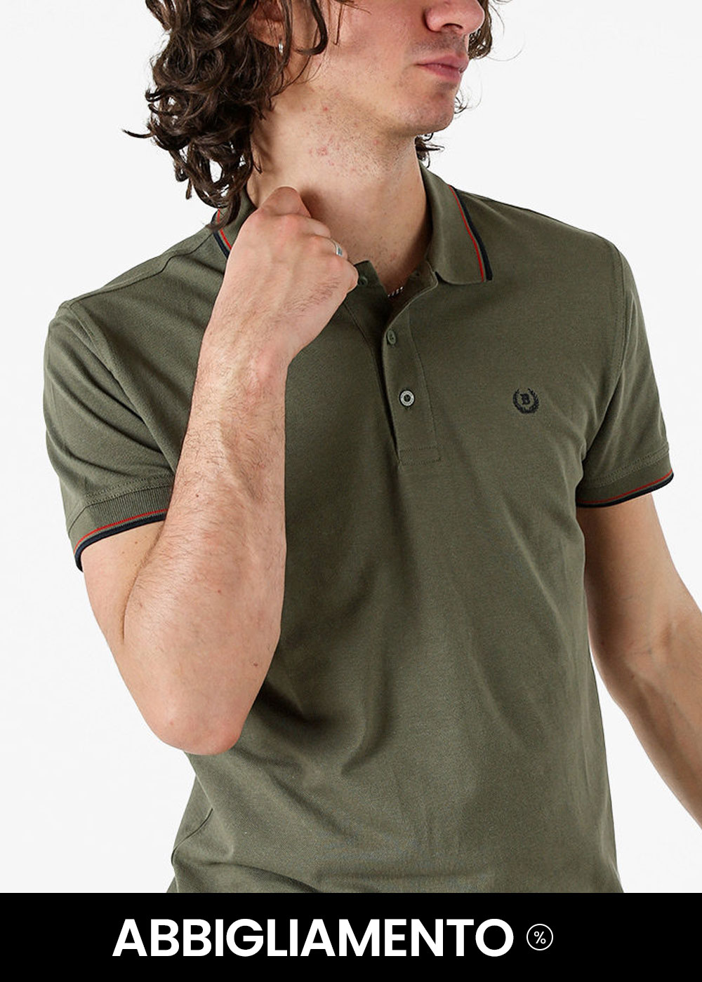 Male model wearing olive green men's polo shirt with red‑black trim and small embroidered chest logo, hand touching collar