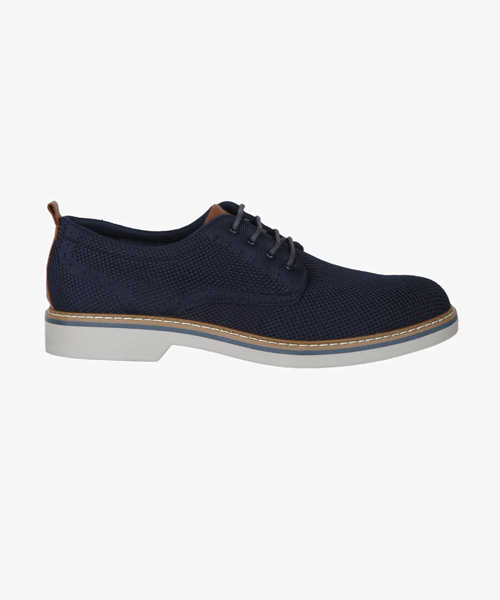 Navy knit men’s lace-up derby shoe with white rubber sole, contrast brown heel tab and stitched welt — lightweight casual dress shoe