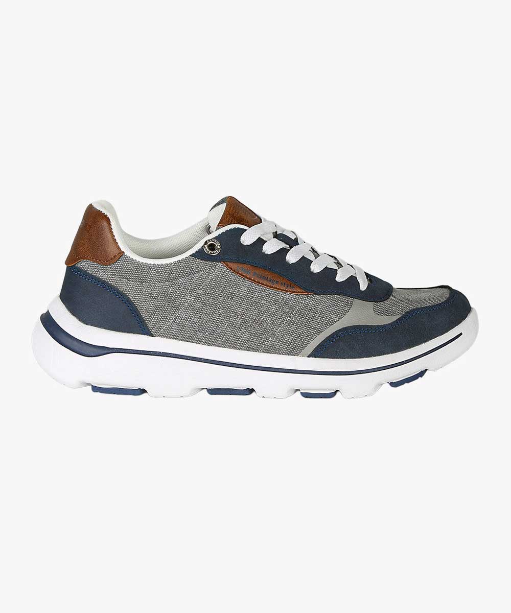 Men's casual lace-up trainer in grey fabric with navy suede panels, brown leather heel tab and white chunky sole