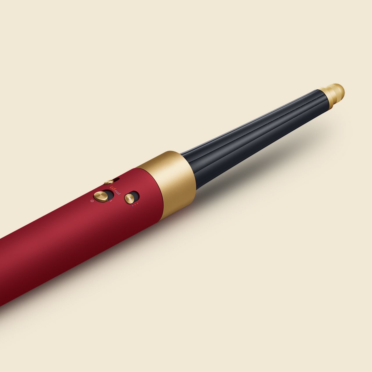 The Dyson Airstrait dryer and straightener in Red velvet and gold.