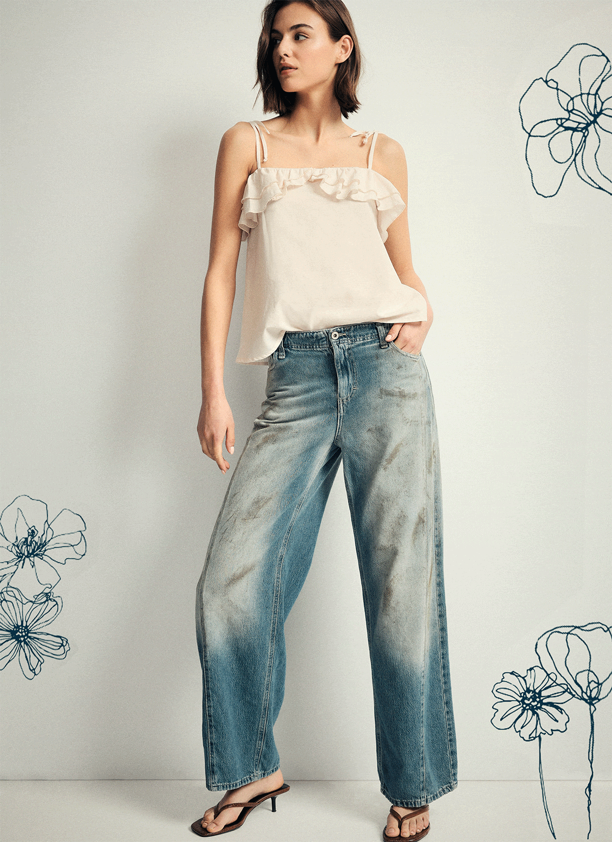 Collage of female model showcasing casual womens outfits: denim jacket, camisole, wide‑leg jeans and relaxed striped top with floral sketch accents