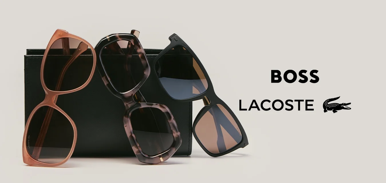 Tre paia di occhiali da sole con montature rosa, tartarugate e nere appoggiati contro una scatola rettangolare nera su uno sfondo chiaro.