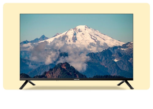 Flat-screen television on stand showing a snow-capped mountain peak with clouds and forested foothills on a beige backdrop