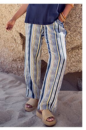 Pantaloni modello Rose in mussola con taglio della gamba ampio, cintura elastica e righe