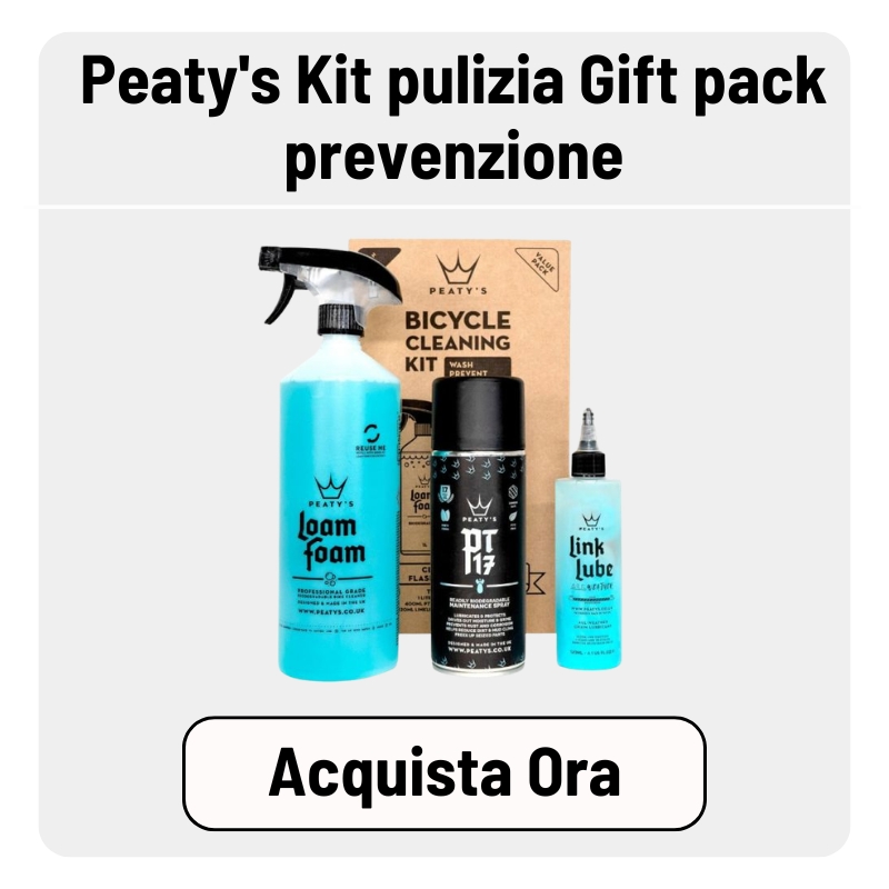 Peaty's bicycle cleaning gift pack with Loam Foam spray bottle, PT17 maintenance spray, Link Lube bottle and kraft box on white background