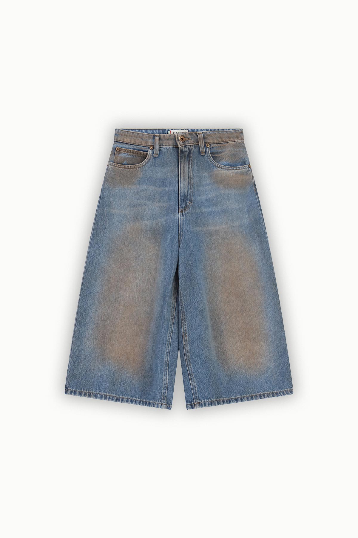 Wide-leg cropped blue denim culotte trousers with faded knee panels and five-pocket styling, laid flat on a white background