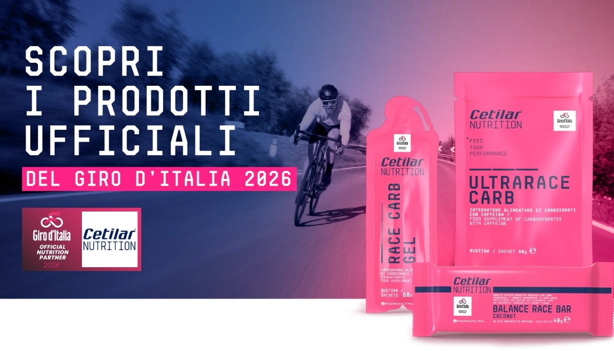 Pink Cetilar Nutrition Ultrarace Carb gel, sachet and Balance Race Bar packaging beside cyclist on road; Giro d'Italia 2026 official products