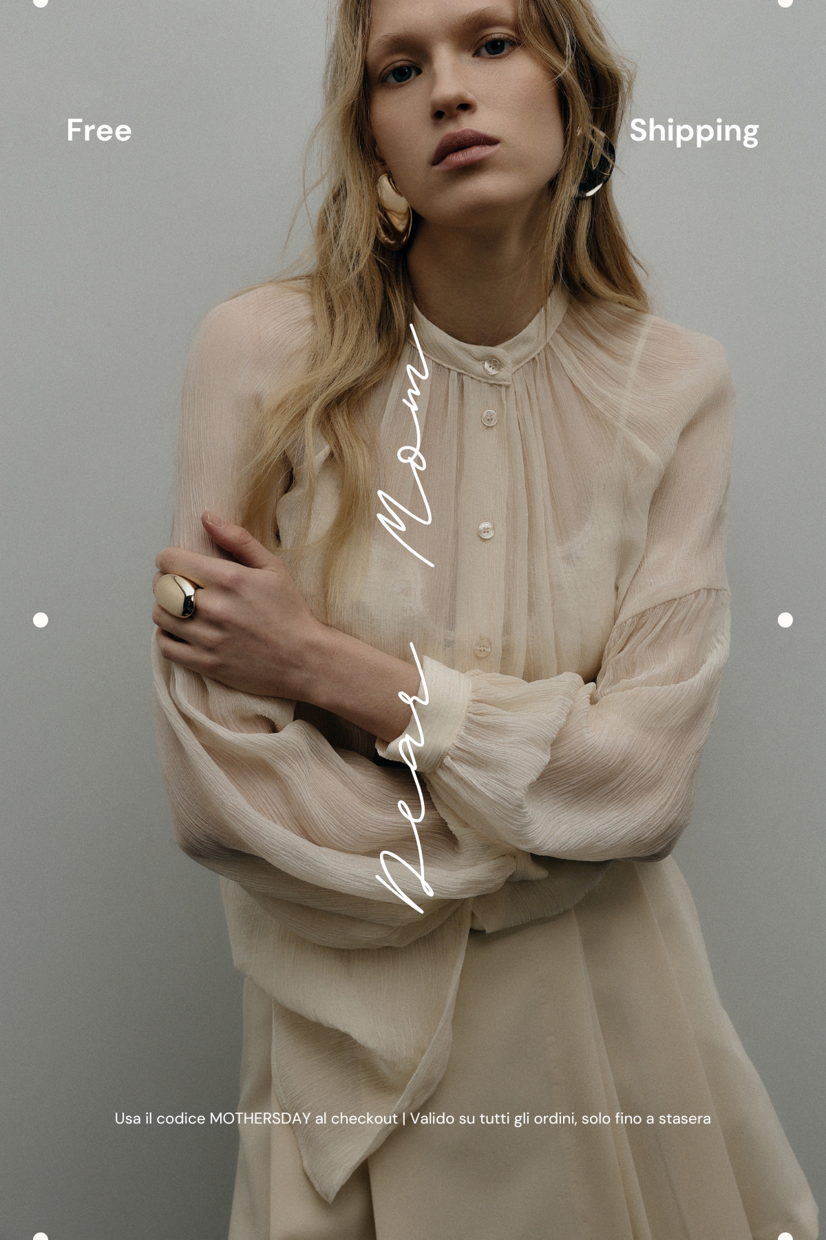 Model wearing a sheer cream blouse and skirt with gold hoop earrings and ring against a neutral background, promotional text visible