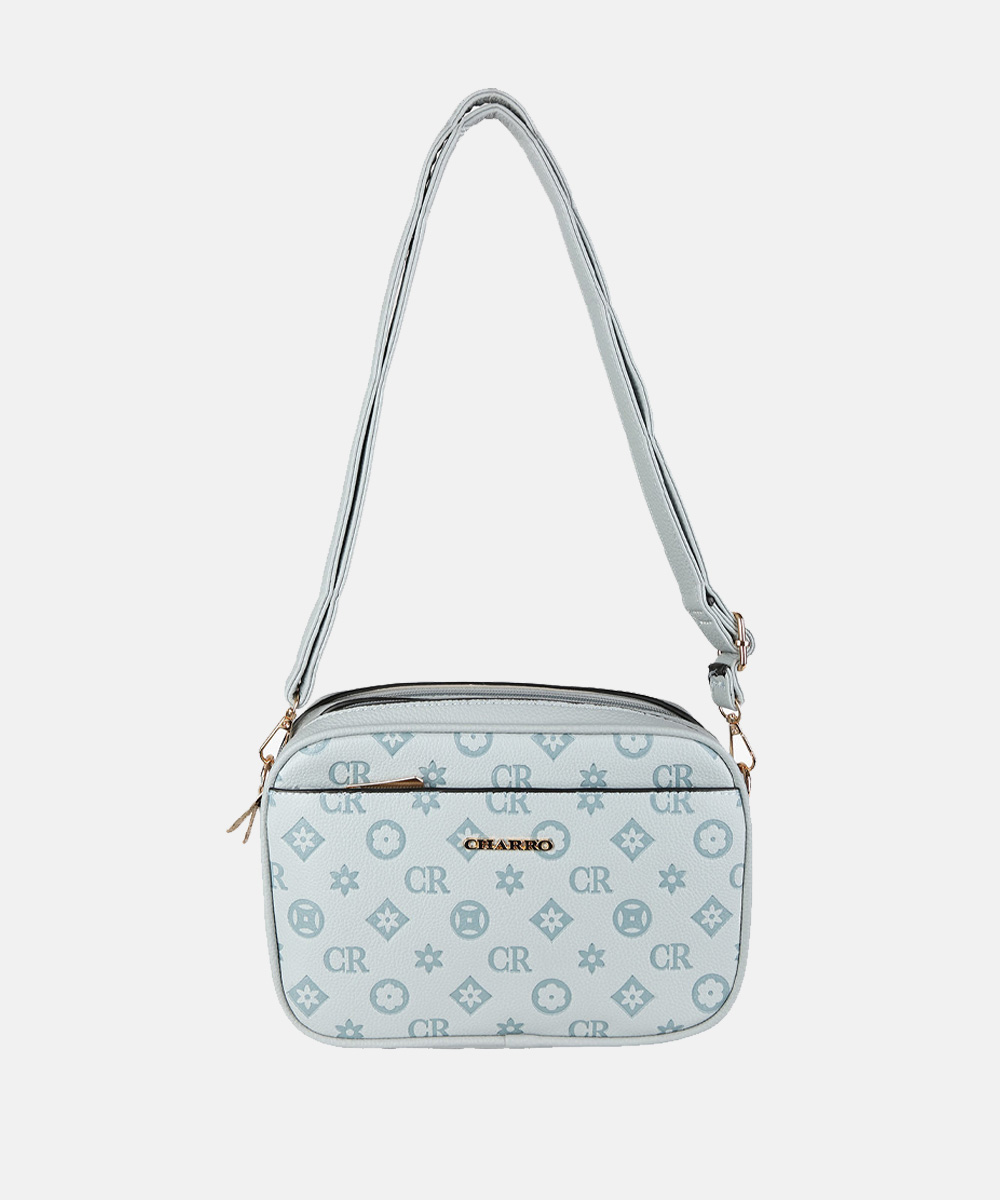 Light blue monogram crossbody shoulder bag with adjustable strap, gold hardware and front zip pocket
