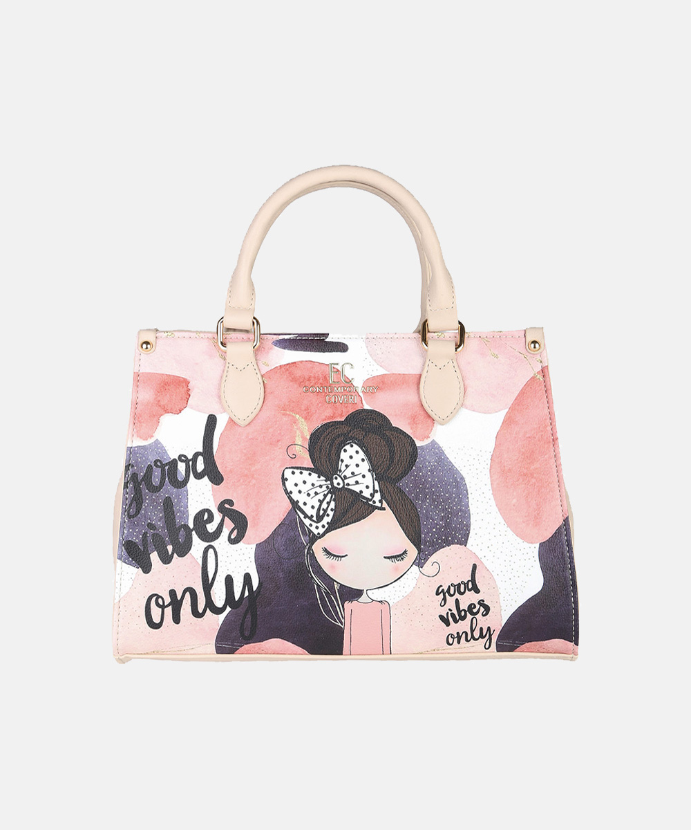Pink and purple painted tote bag with beige handles, illustrated girl wearing a polka-dot bow and 'good vibes only' text