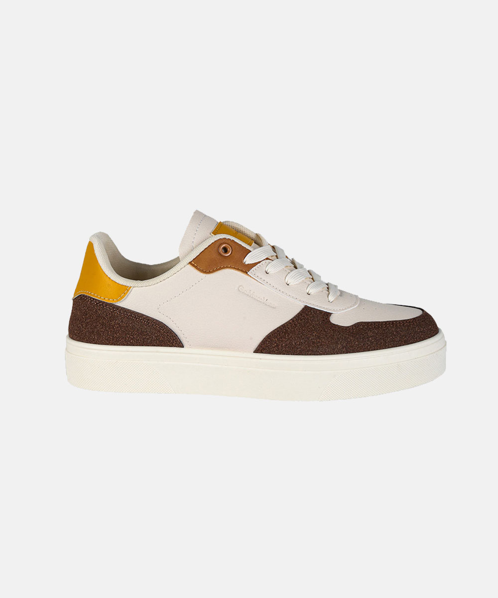 Side view of cream low-top lace-up trainer with brown textured panels and yellow heel accent on a light background