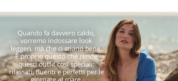 Blusa dal taglio lungo in tessuto velato con collo da camicia e maniche lunghe