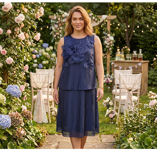 Abito midi dal taglio smanicato in chiffon con applicazioni floreali e scollo a girocollo