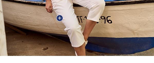 Pantaloni modello Mony lunghi fino al polpaccio in tessuto elasticizzato con tasche con zip