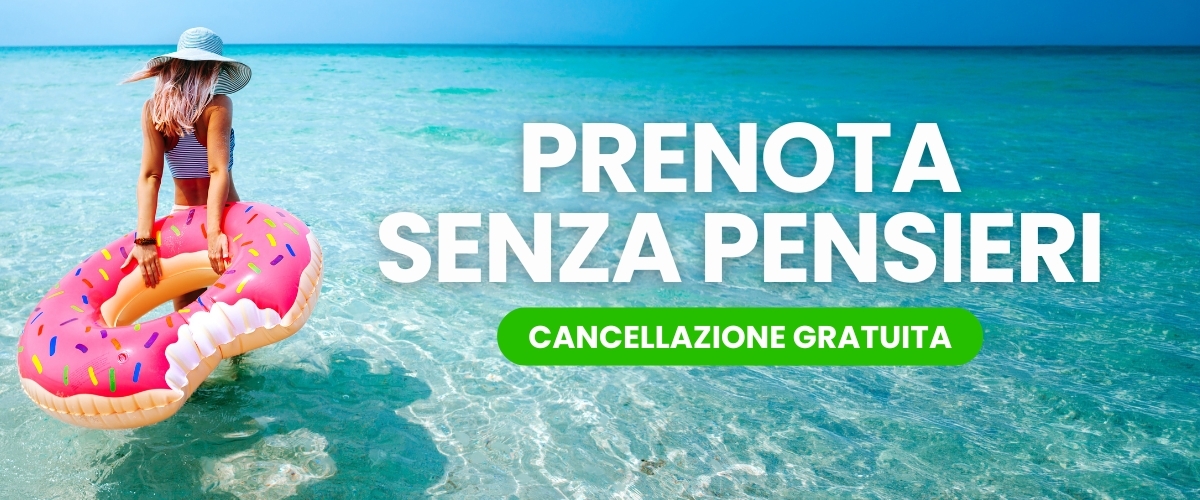 Woman in sunhat holding pink donut inflatable wading in clear turquoise sea beside text 'Book worry-free - free cancellation'