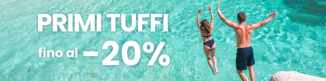 Two people jumping off a pier into clear turquoise sea with promotional banner reading "Primi Tuffi fino al -20%"