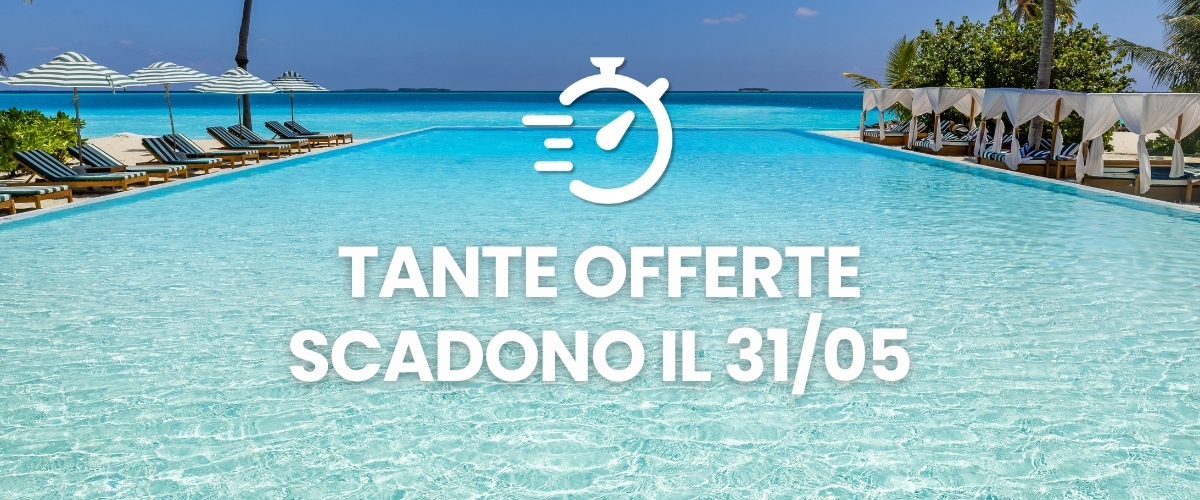 Tropical infinity pool at a luxury beach resort with sunbeds and cabanas; promotional text: offers expire 31 May